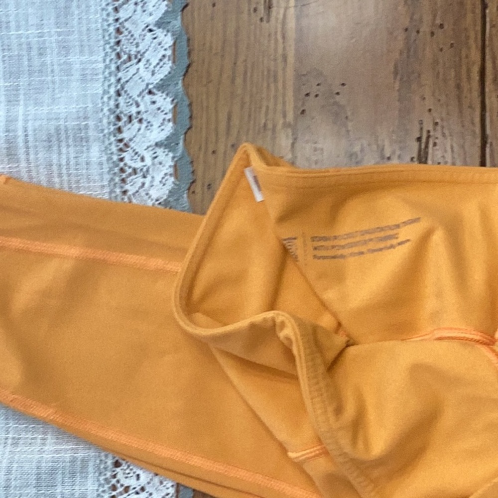 Athleta Orange Stash Pocket Leggings - Picture 4 of 4